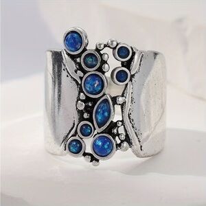 Silver and Blue Wilde Band Gemstone Ring - Hollow Openwork Design